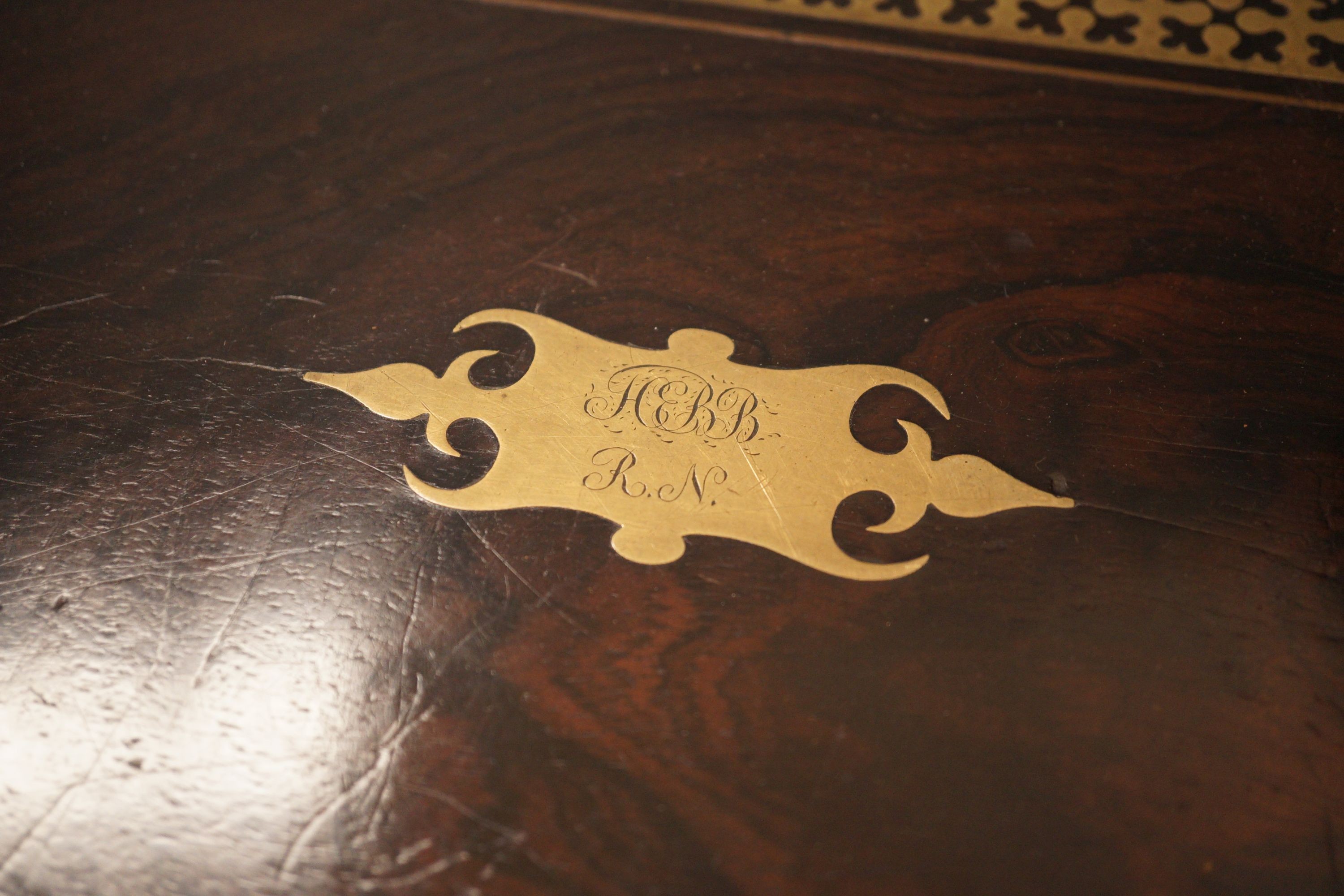 A George IV cut brass banded rosewood writing box, 35cm